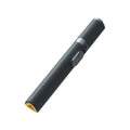 Mobile Bluetooth live streaming integrated stand selfie stick in black alloy on a tabletop with smartphone attached for hands-free recording.