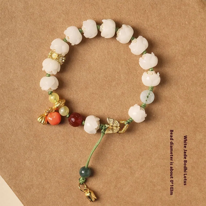 White jade bodhi bracelet with lotus and pumpkin beads on open rope