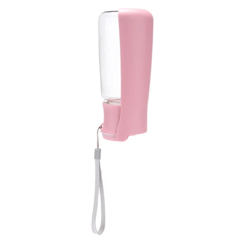 Foldable dog water bottle with dispenser in blue, pink or white colours showing collapsed and expanded states