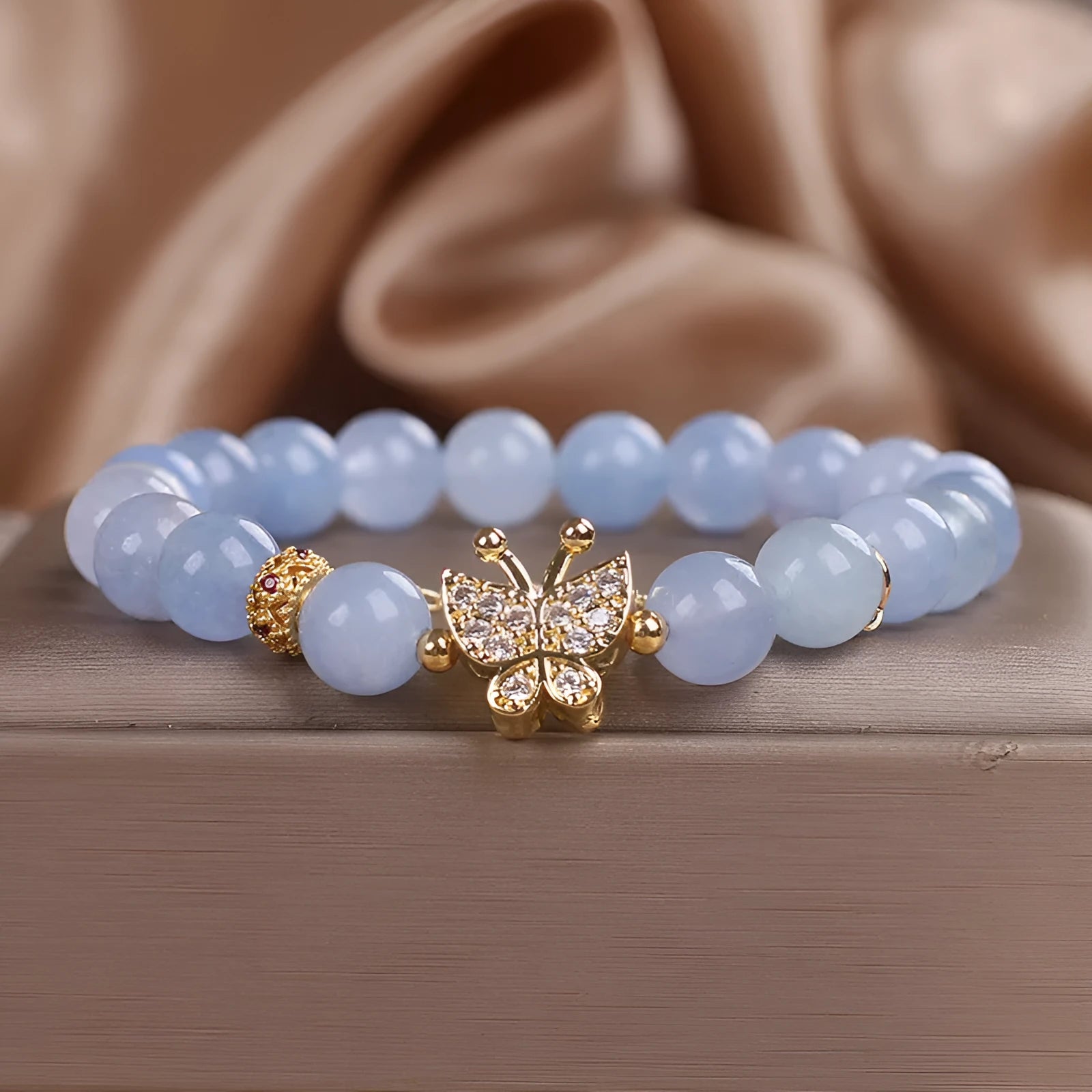 Sky blue aquamarine butterfly crystal bracelet with pearls and rhinestones, 17cm length