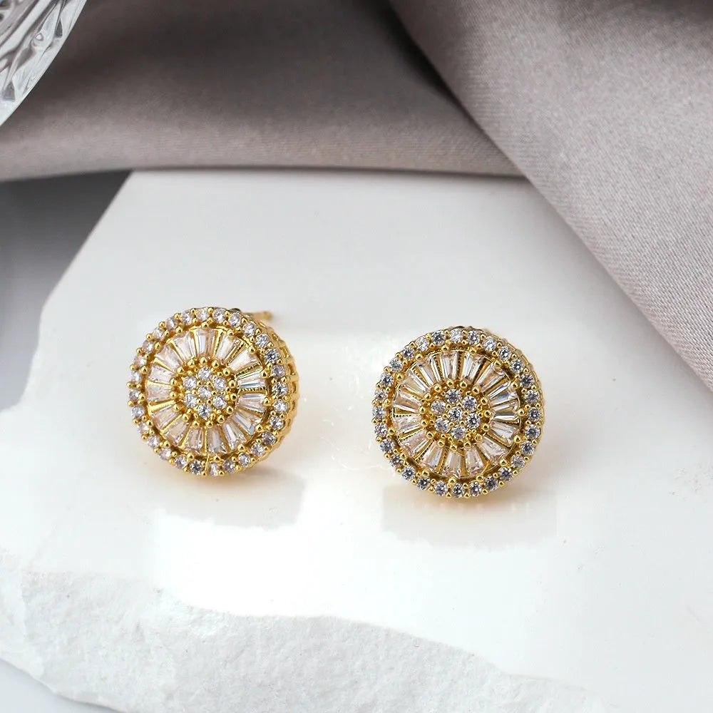 Geometric round pattern gold-coloured earrings on a white background, showcasing Ins style niche design.