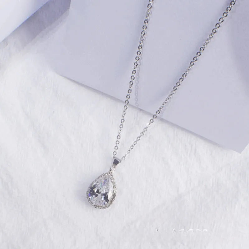 Women's rose gold geometric drop necklace with rhinestone inlay in pink colour