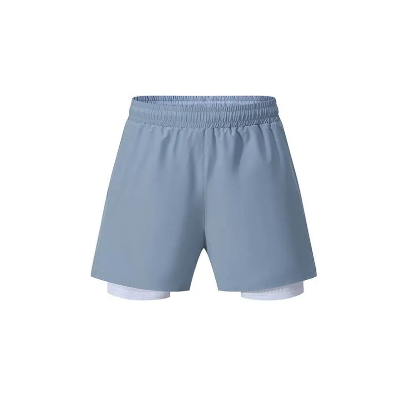 Men's black double-layer running shorts with an inner liner, shown on a size chart.