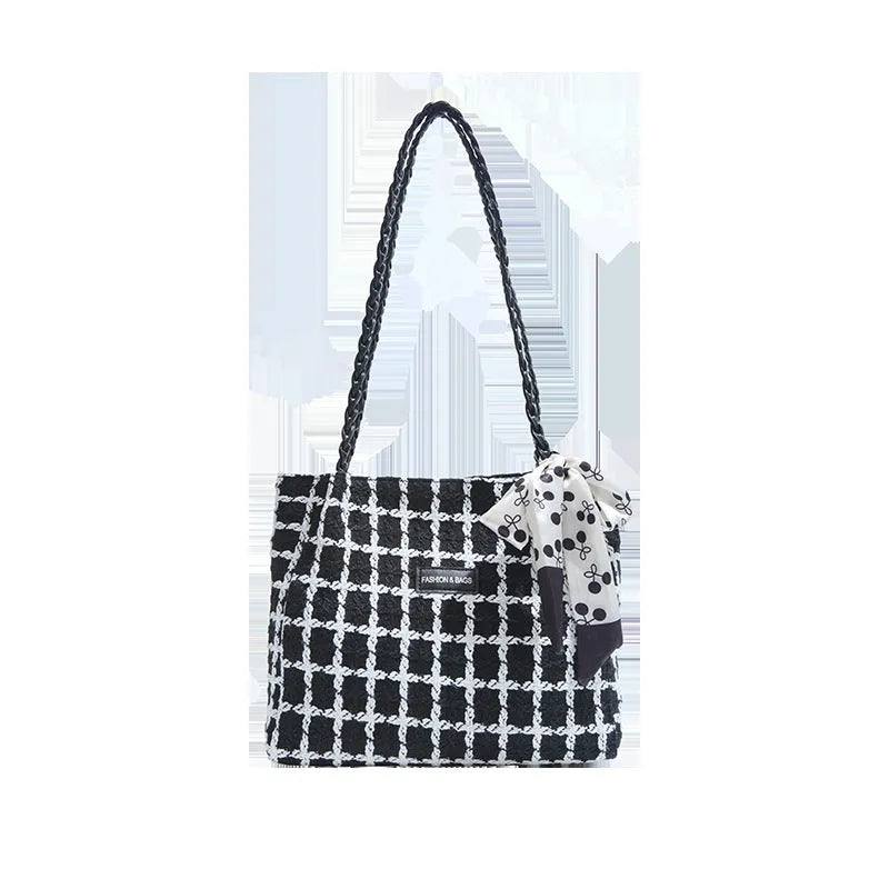 Black woven wool shoulder bag with horizontal square design and internal organisation compartments