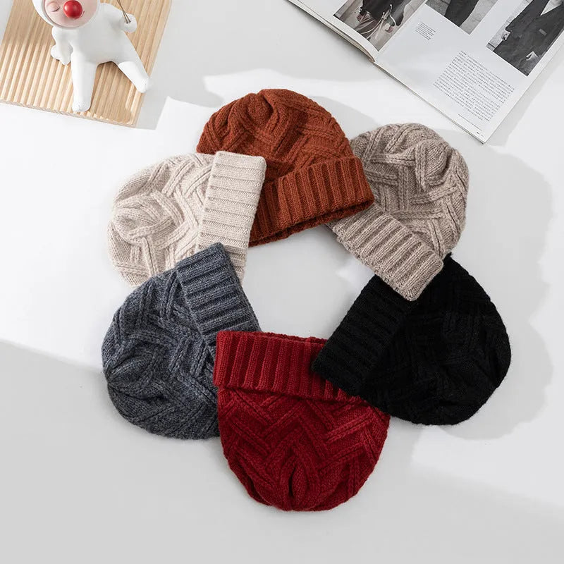 Wool knitted dome crown winter hat in assorted colours featuring a totem pattern.