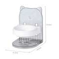Grey adjustable height cat feeding bowl with anti-spill neck protection hanging on cage bars.