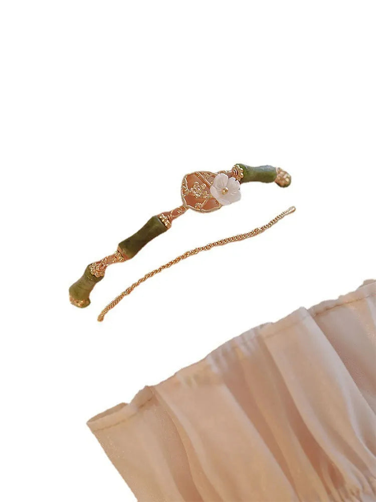 Natural olivine double layer bracelet with twin bells of Ireland charms and olive branch elements