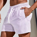 Men's loose-fit mesh football shorts in sports style with micro-elastic polyester fabric for summer wear