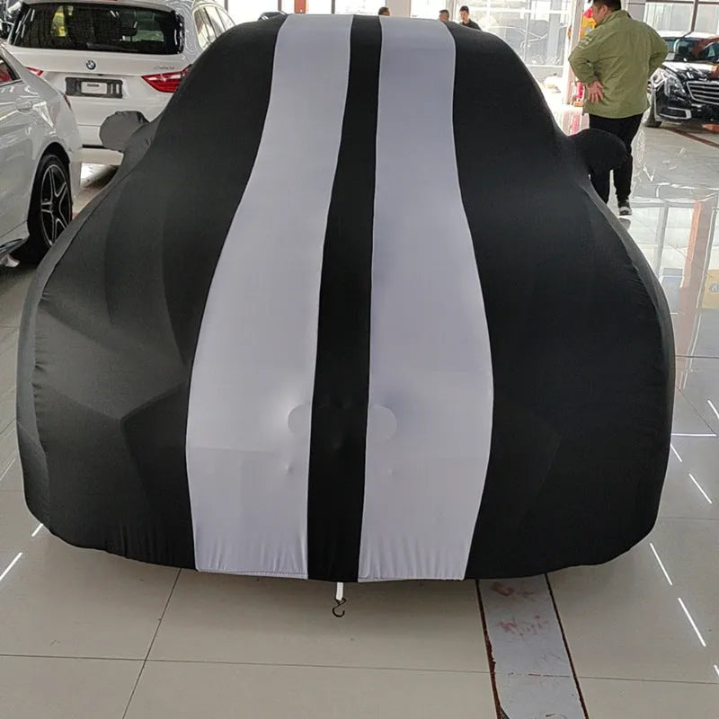 Elastic silk polyester fibre car cover fitted on Ford Mustang vehicle showing stretch-fit design