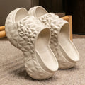 Women's high heel flip flop slippers with a thick EVA sole in khaki, black, and white colour options.