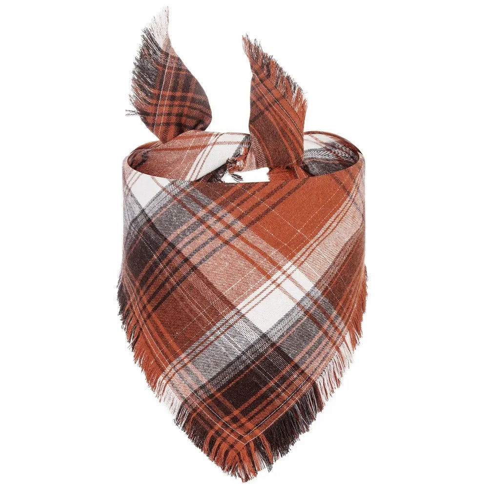 Plaid triangle dog bandana with tassels in autumn colours like orange and brown