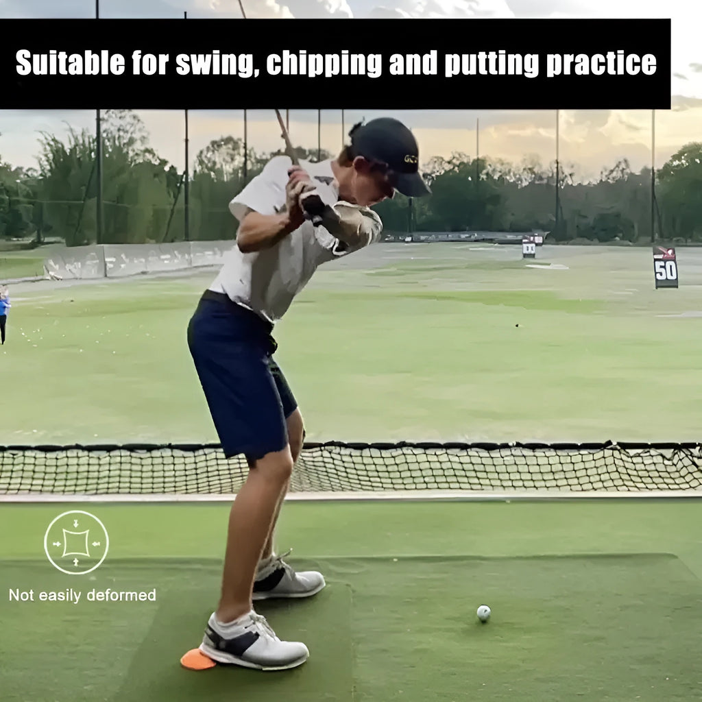 Orange golf centre of gravity training mat on practice surface
