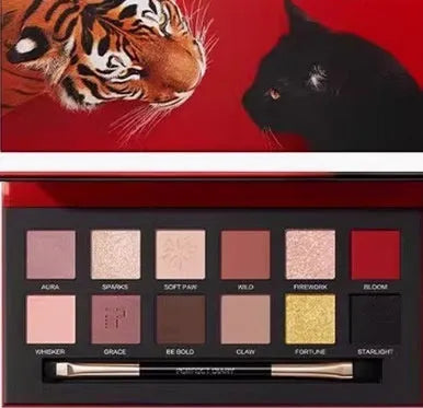 Explorer animal theme eyeshadow palette showing twelve colours across nine named plates.