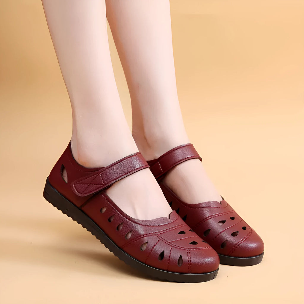 Women's hollow flat sandals in black with Velcro strap and imitation leather upper
