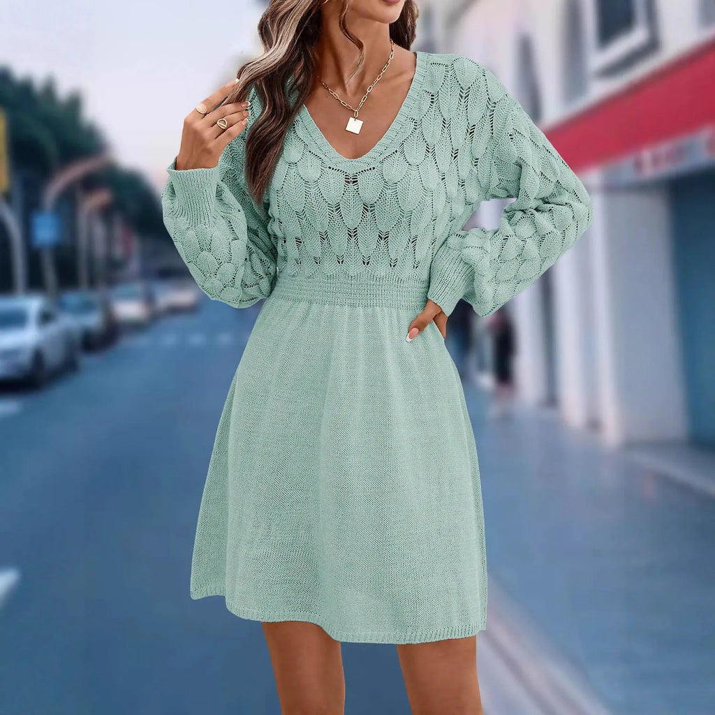 Women's artistic retro V-neck long sleeve dress in a light blue green colour with a 3D pattern detail.