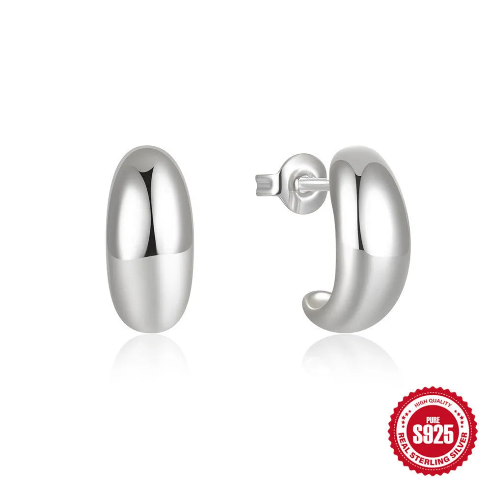 S925 sterling silver C-shaped ringstud earrings with a glossy gold electroplated finish.
