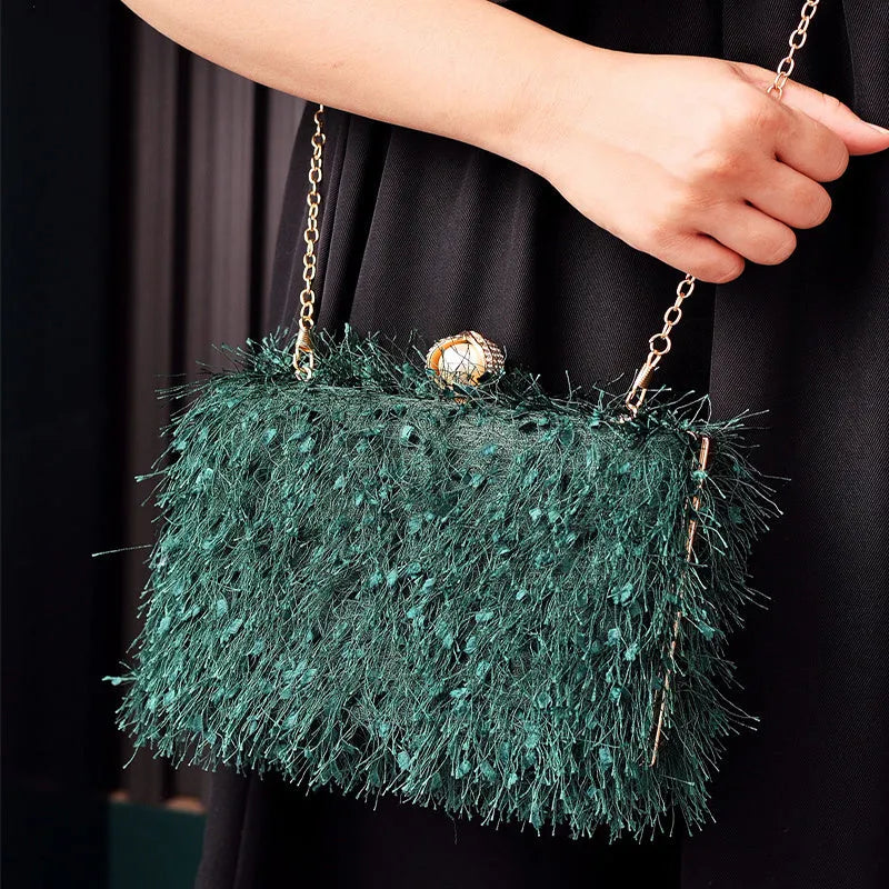 Tassel handbag for women with lock closure and tassel detail, cylinder shape, available in multiple colours