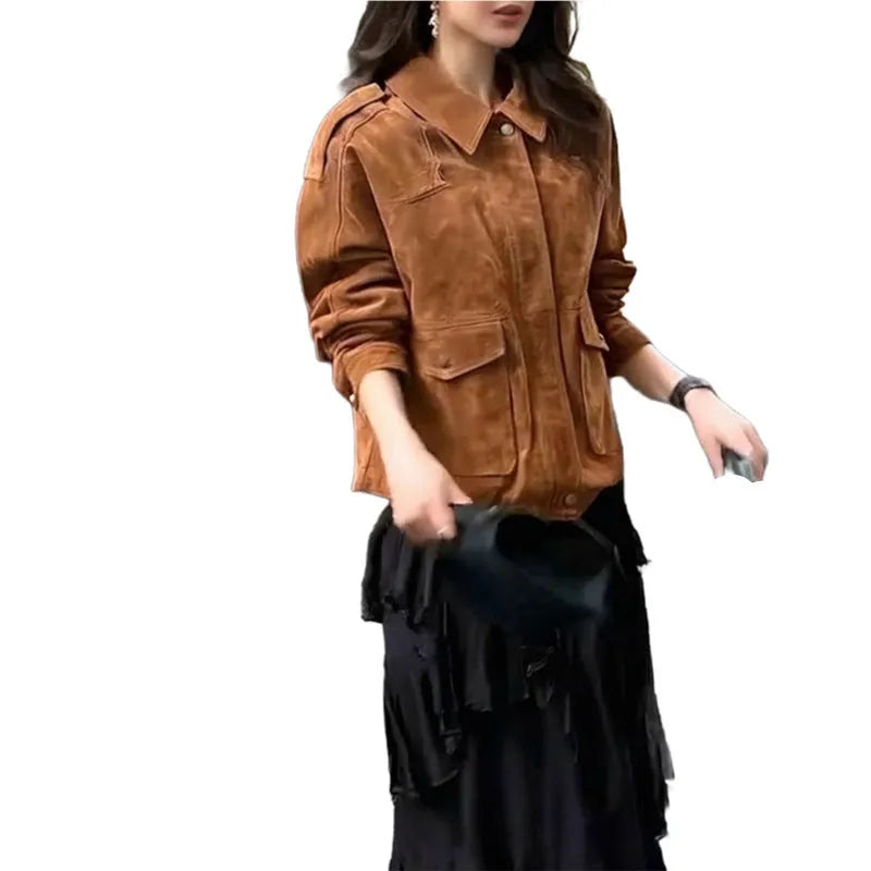 Bright brown suede-effect women's coat with regular sleeves on a hanger