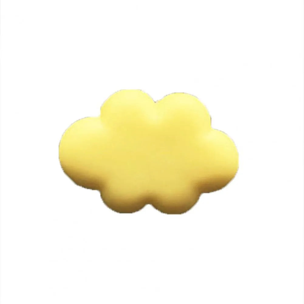Resin cartoon-style car fragrance clip attached to a vehicle air vent.