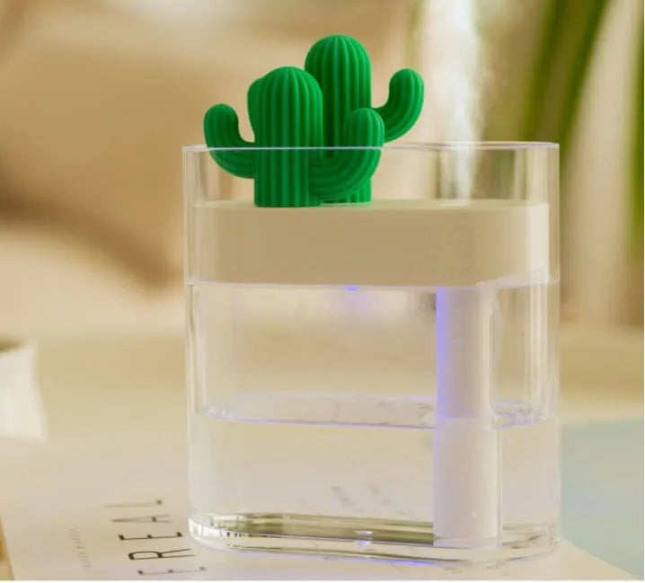 Transparent green cactus portable USB humidifier on a desktop with cable, 120x45x93mm