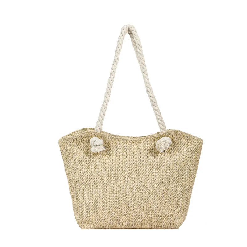 Women's straw shoulder handbag in white or khaki with clamshell opening, single strap, and phone bag