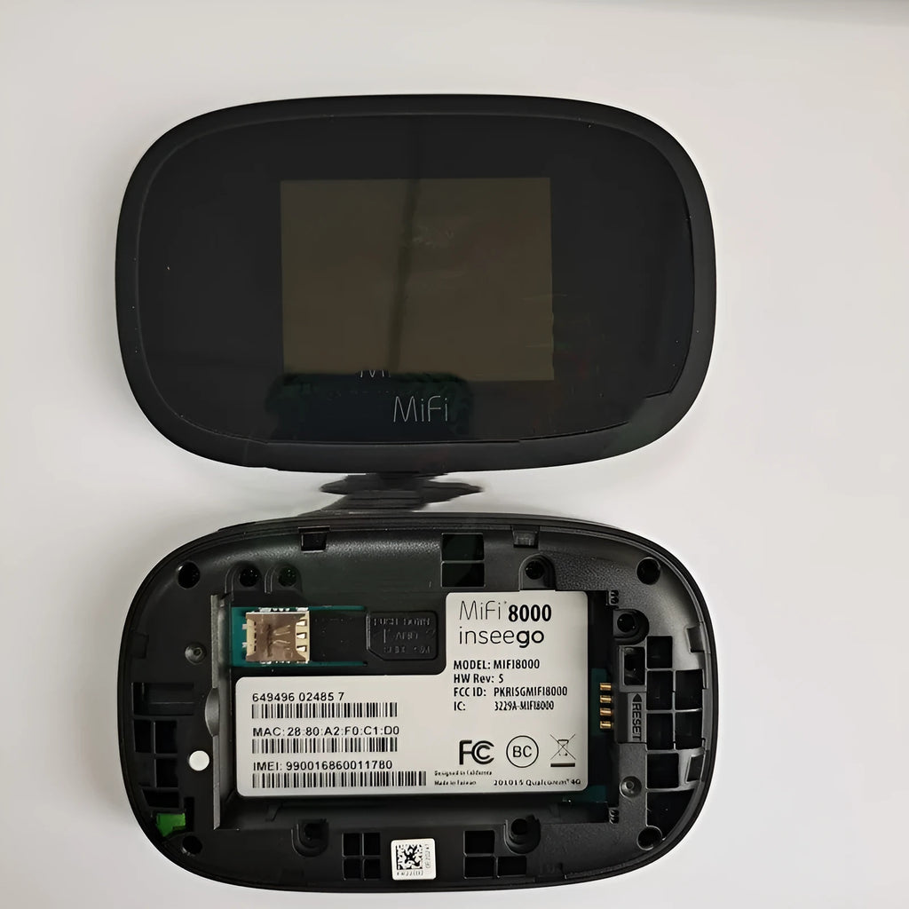 Black mifi8000 4G portable WiFi router with removable battery on a table
