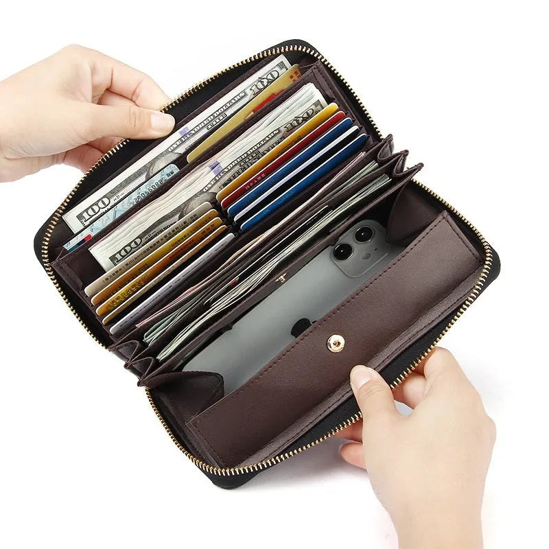 Genuine leather long wallet in black, showing large-capacity design and card slots.