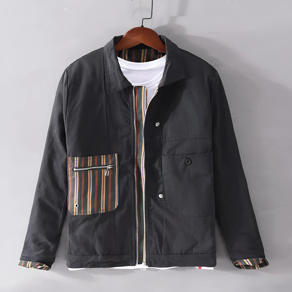 Men's black striped contrast jacket with zip front, cotton filling, side seam slip pockets, and straight hem.