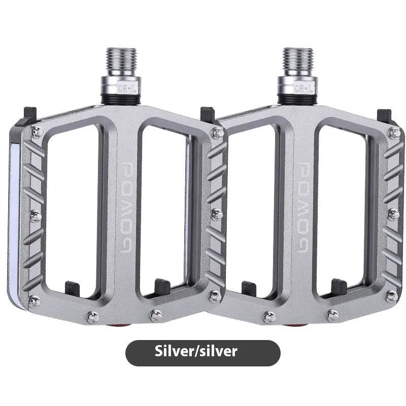 Pair of aluminium alloy bicycle pedals with integrated 710 LED lights in a choice of colours.