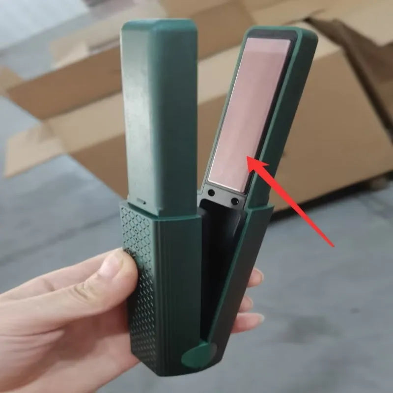 Pink and green cordless USB hair straightener with ceramic plates and digital temperature display.
