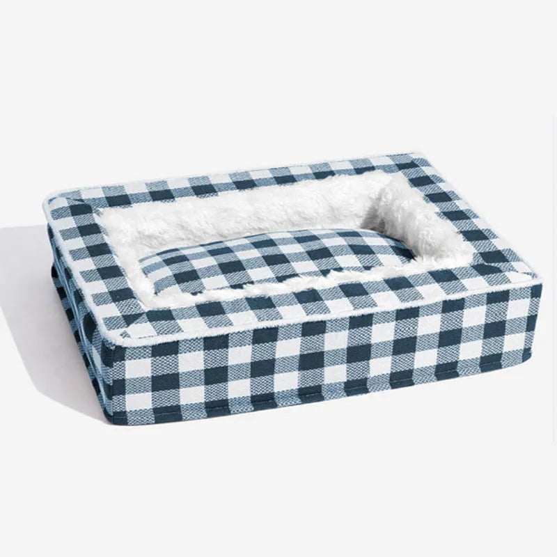 Classic plaid removable dog kennel mat in red, shown inside a wire crate