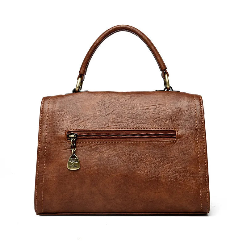 A soft PU leather women's one-shoulder crossbody bag in a horizontal square shape with retro styling.