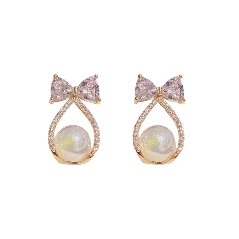 Women's alloy bow earrings with electroplating finish in colour as shown in main image