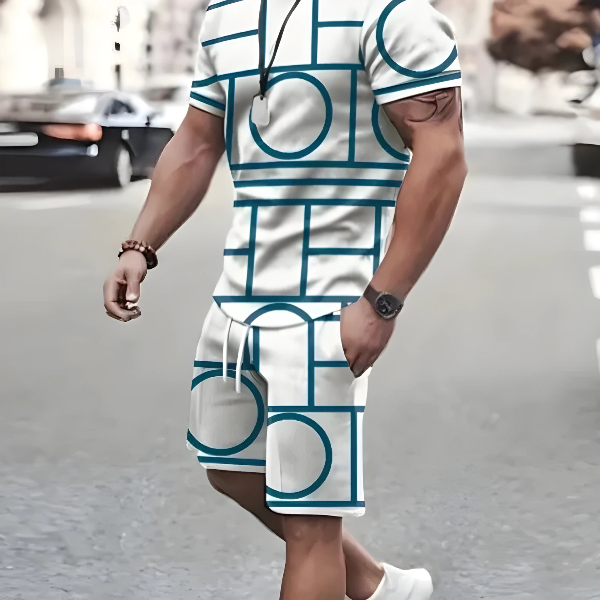 Grey polyester sports set with short-sleeved T-shirt and shorts on a hanger