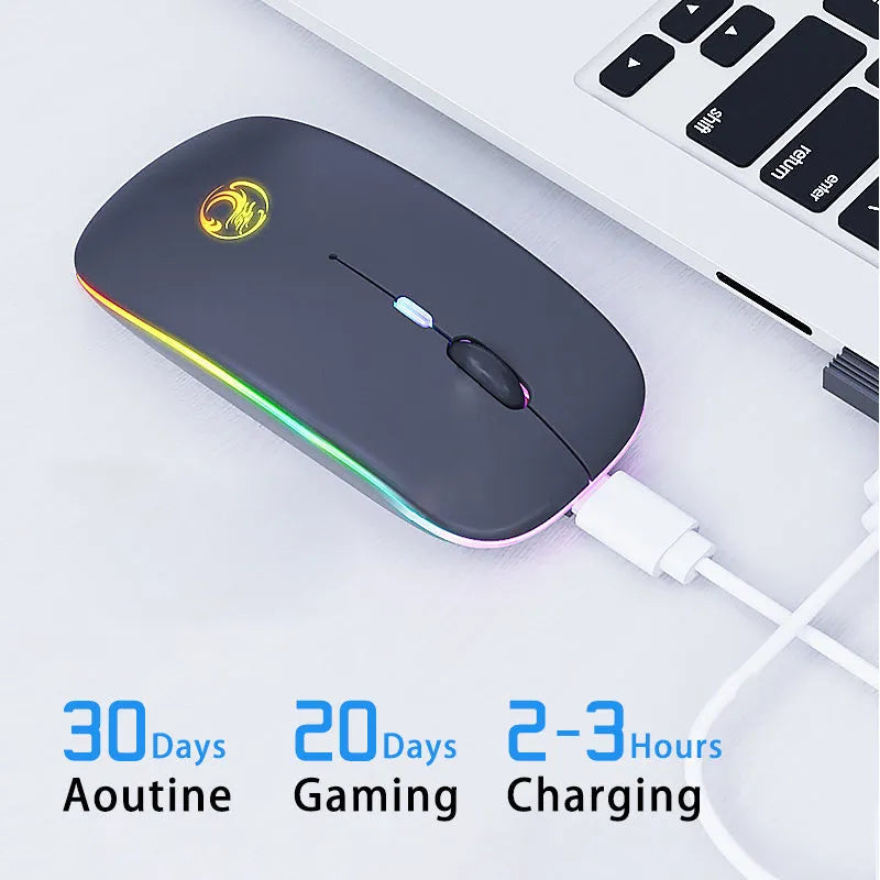 White rechargeable dual-mode silent wireless mouse with blue scroll wheel light on a wooden desk