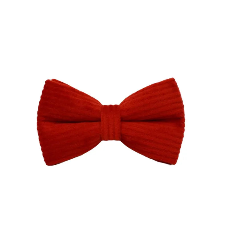 Red corduroy dog collar and leash set with matching vest, bow tie, and poo bag