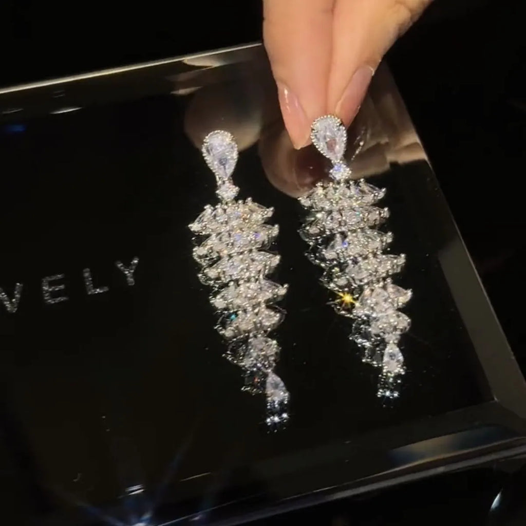 Silver pagoda coloured Christmas tree drop earrings with sparkling zircon accents on copper construction