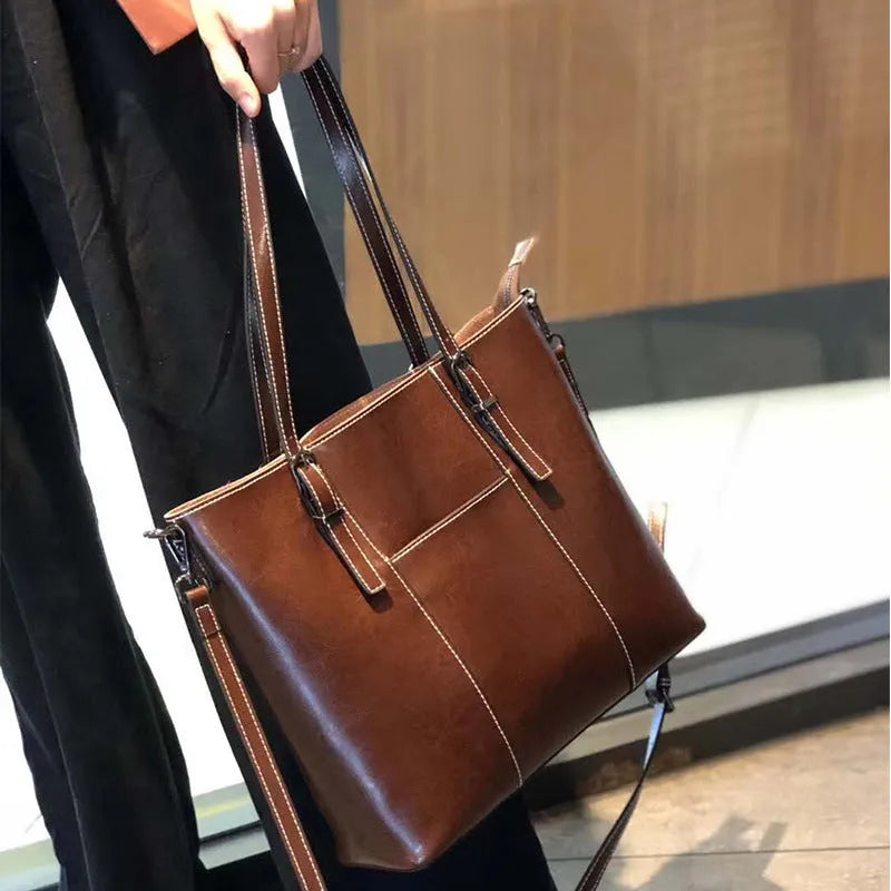 Brown genuine leather women's retro shoulder bag with three straps and multiple pockets