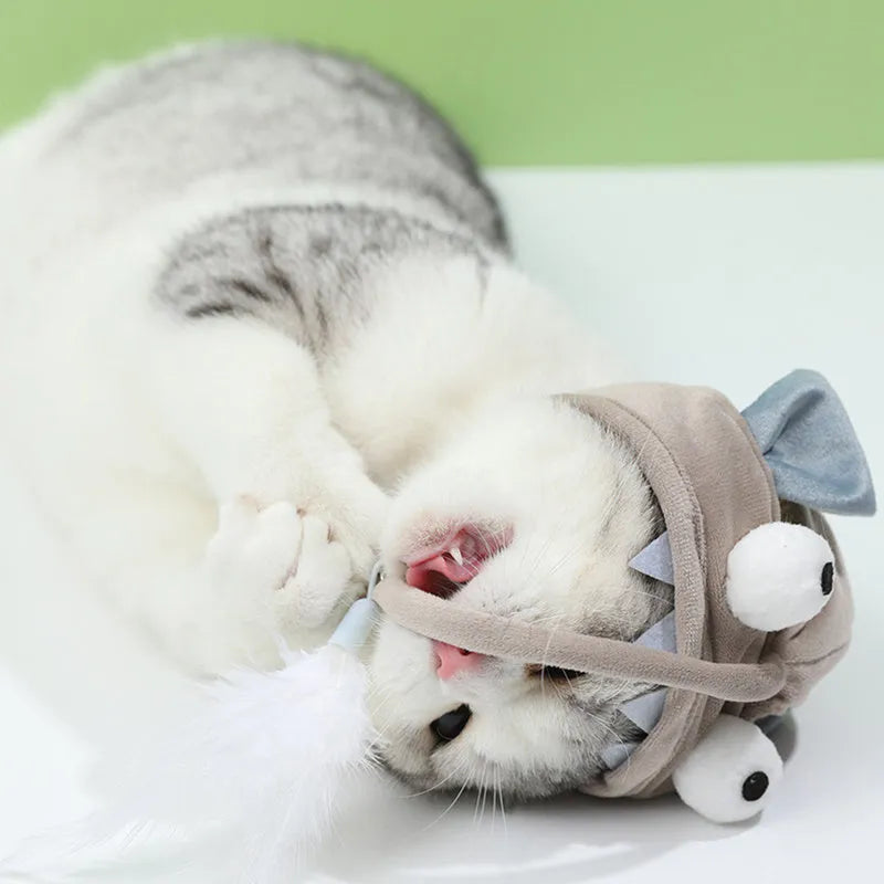 Adjustable head-mounted cat teaser toy with grey big eye fish attachment and dinosaur design