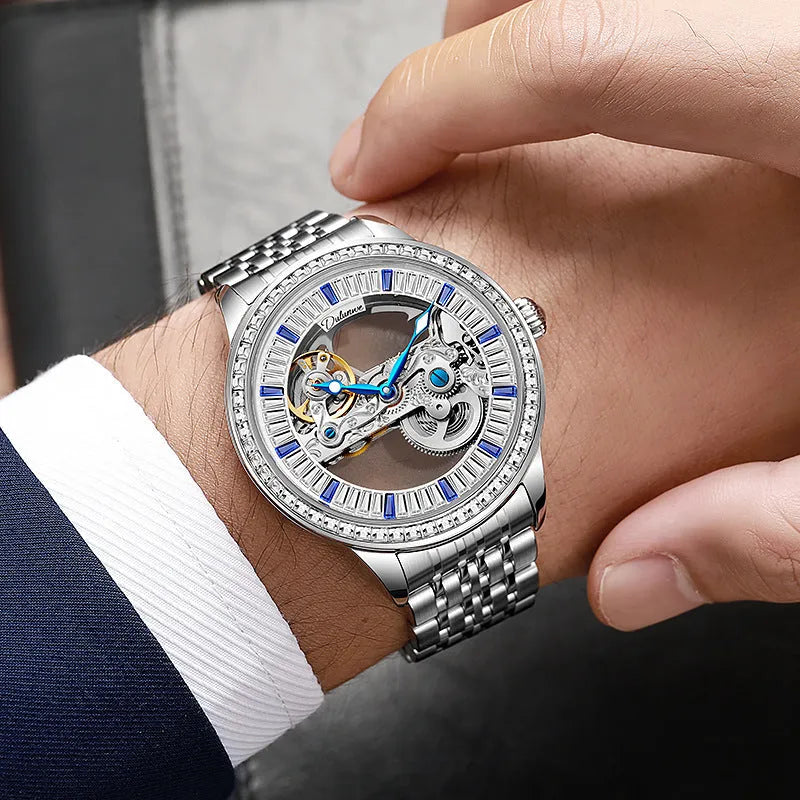 Men's rose gold zircon dial mechanical watch with leather strap and transparent case back.