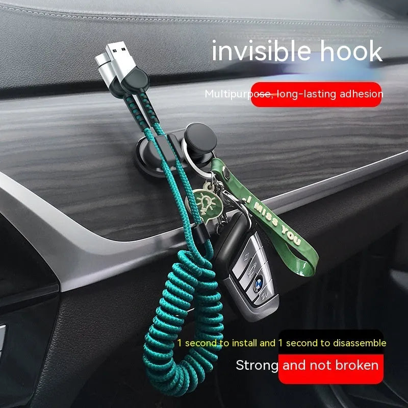 Dark green car data cable storage hook made of ABS silicone showing compact dimensions