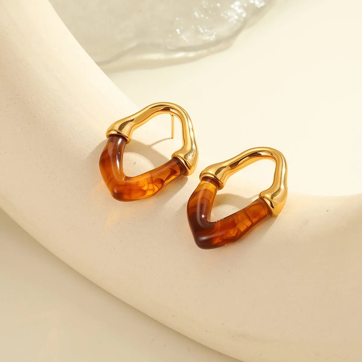 Women's stainless steel earrings with colour resin stitching in pink and blue, 18K electroplated finish