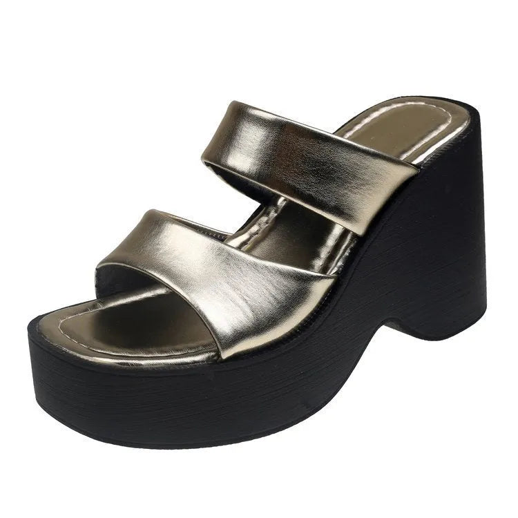 Women's black wedge platform slippers with square toe on a white background.