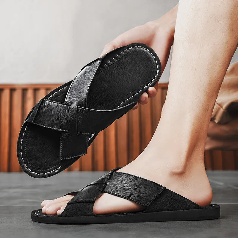 Men's black and brown pigskin leather slip-on sandals with a frosted texture and rubber sole.