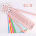 Pink and black 12-in-1 decorative edge paper cutting machine for A4 paper on a desk.