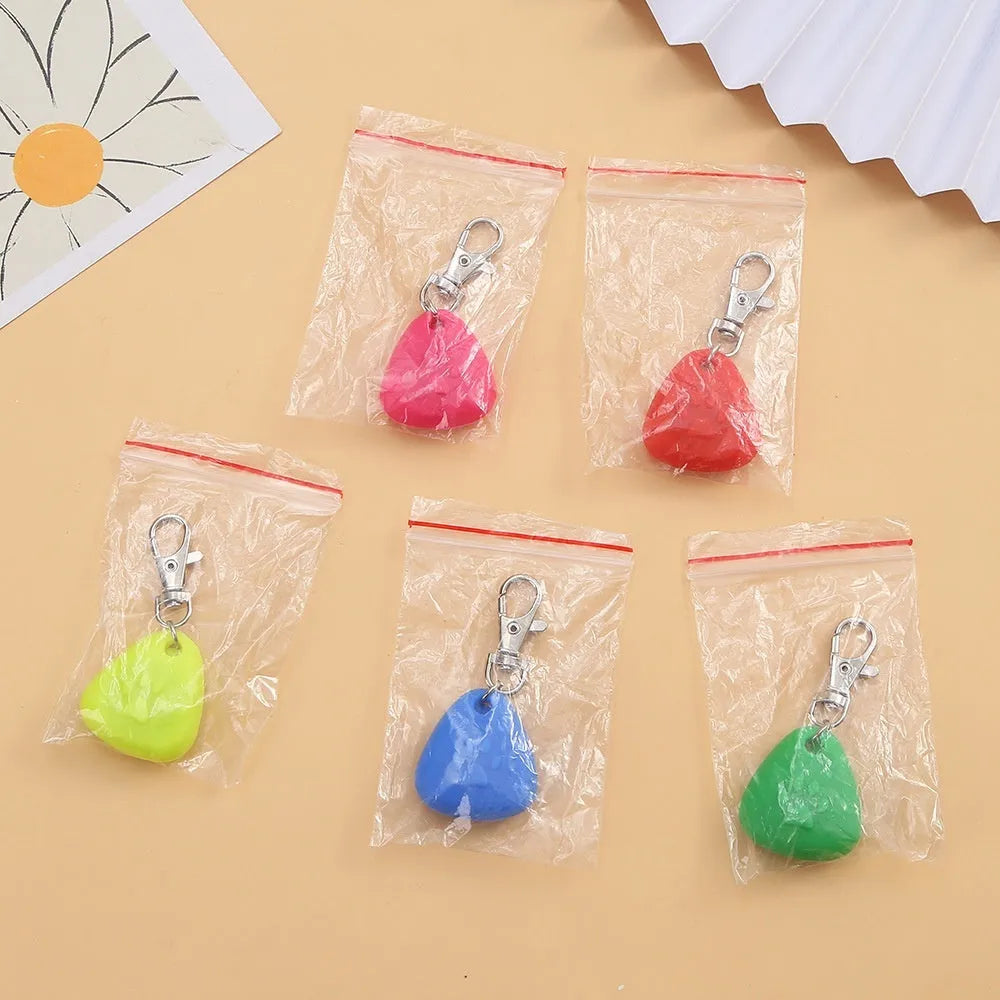 Silicone triangle-shaped light-up pet pendant ornament in red, pink, blue, green, or yellow.