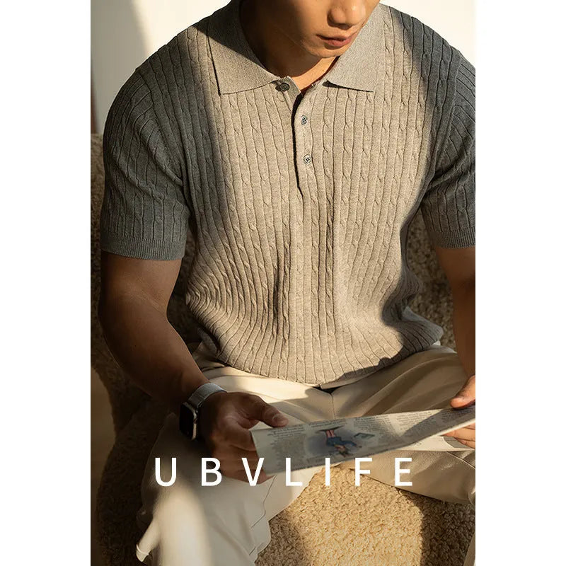 Men's khaki short-sleeve versatile top on a hanger, showing business casual style.