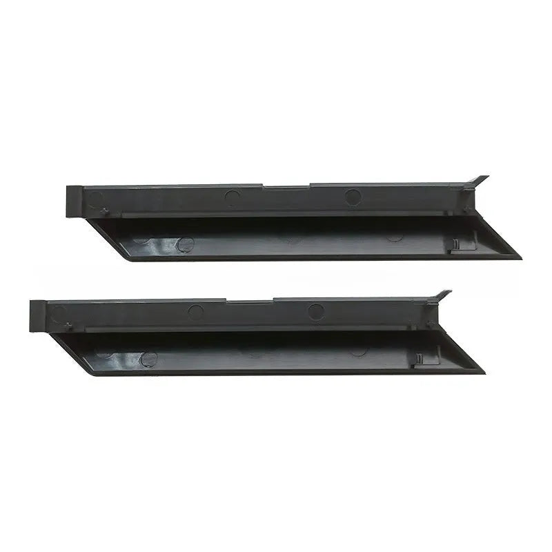 Black PS4 Pro hard drive bottom cover and internal service parts including a baffle and block strip.