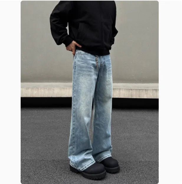 Men's blue straight jeans with whisker washing on thighs and flared leg design