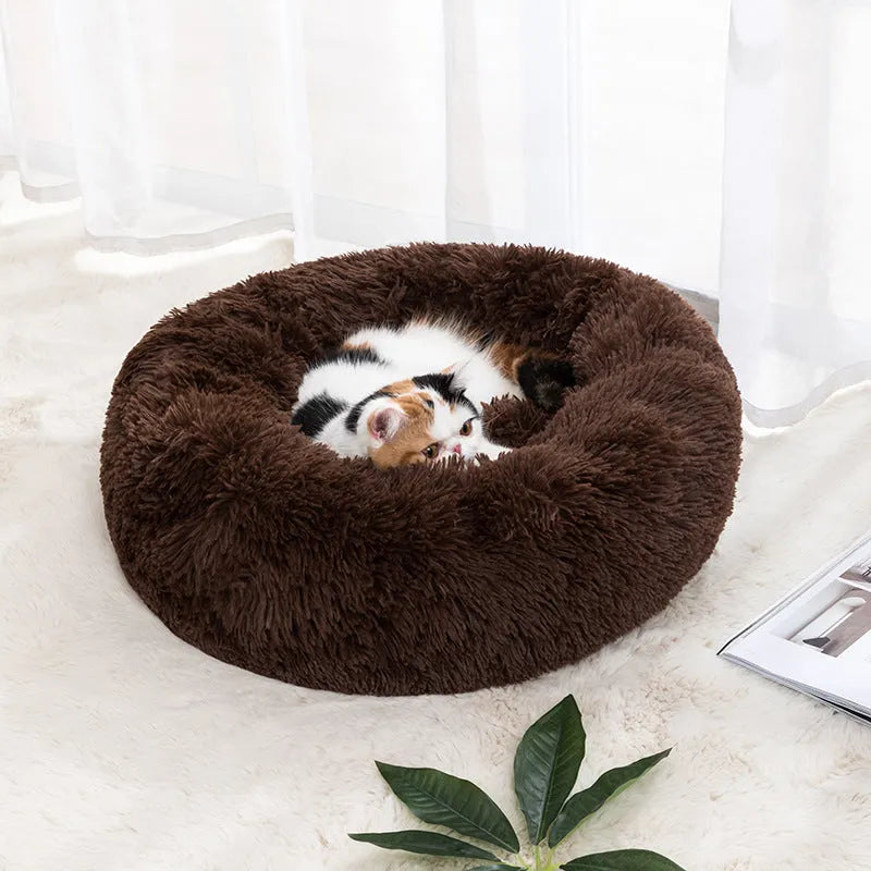 Round cloth cat bed in winter warm design, available in 30cm to 100cm diameters and six colours.